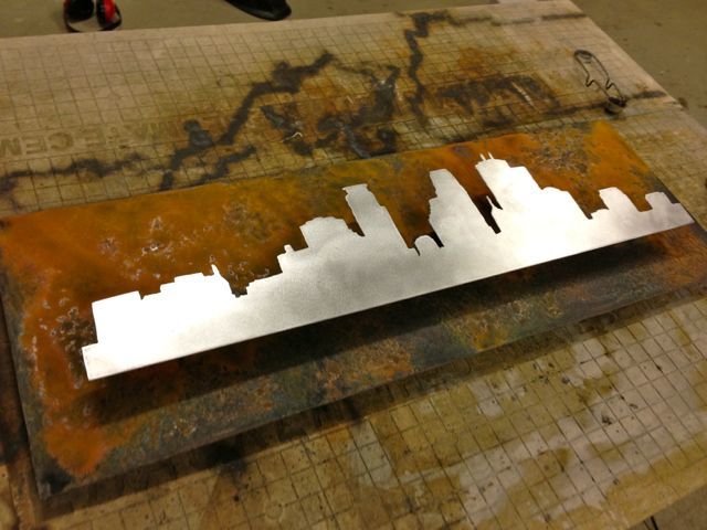 Center the Silhouette on the background and then weld them together.