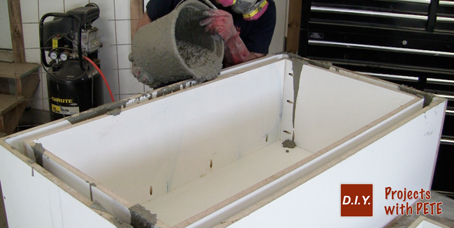 pouring-concrete-into-a-mold