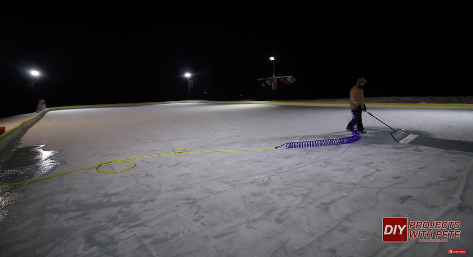 Nice Rink ice resurfacer with coiled hose