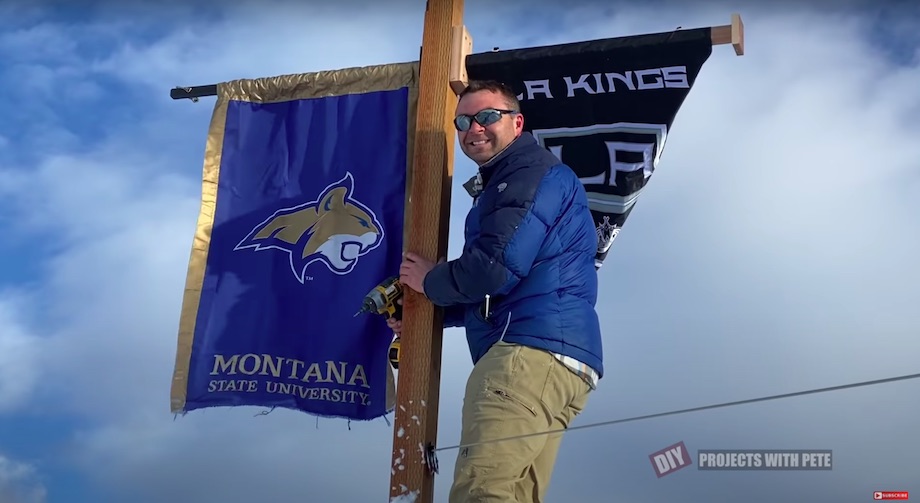 Hanging team banners for Montana State University and the LA Kings