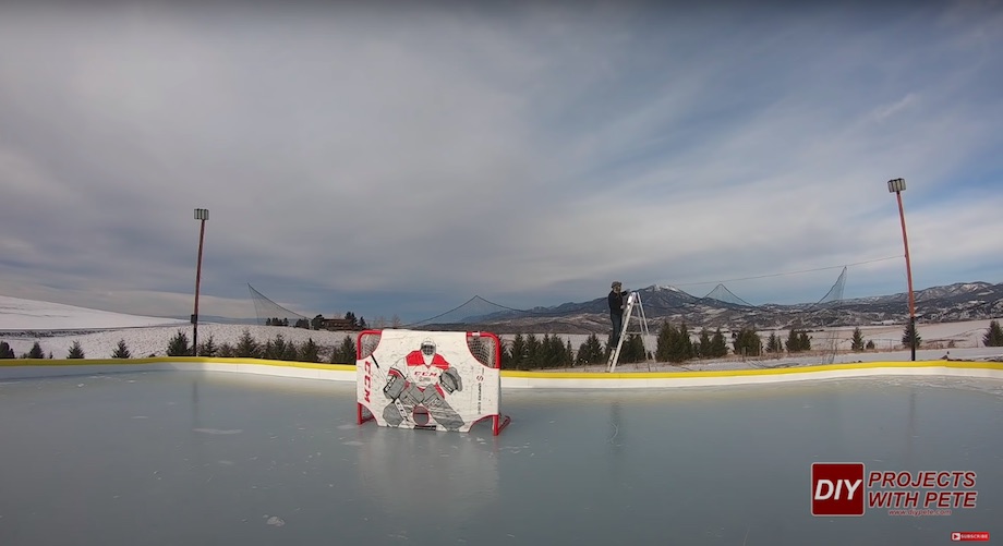 Hanging a net behind the goal to catch pucks