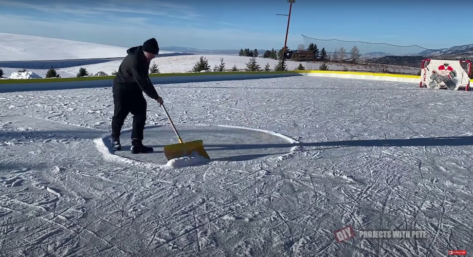 Shoveling the outdoor ice rink often